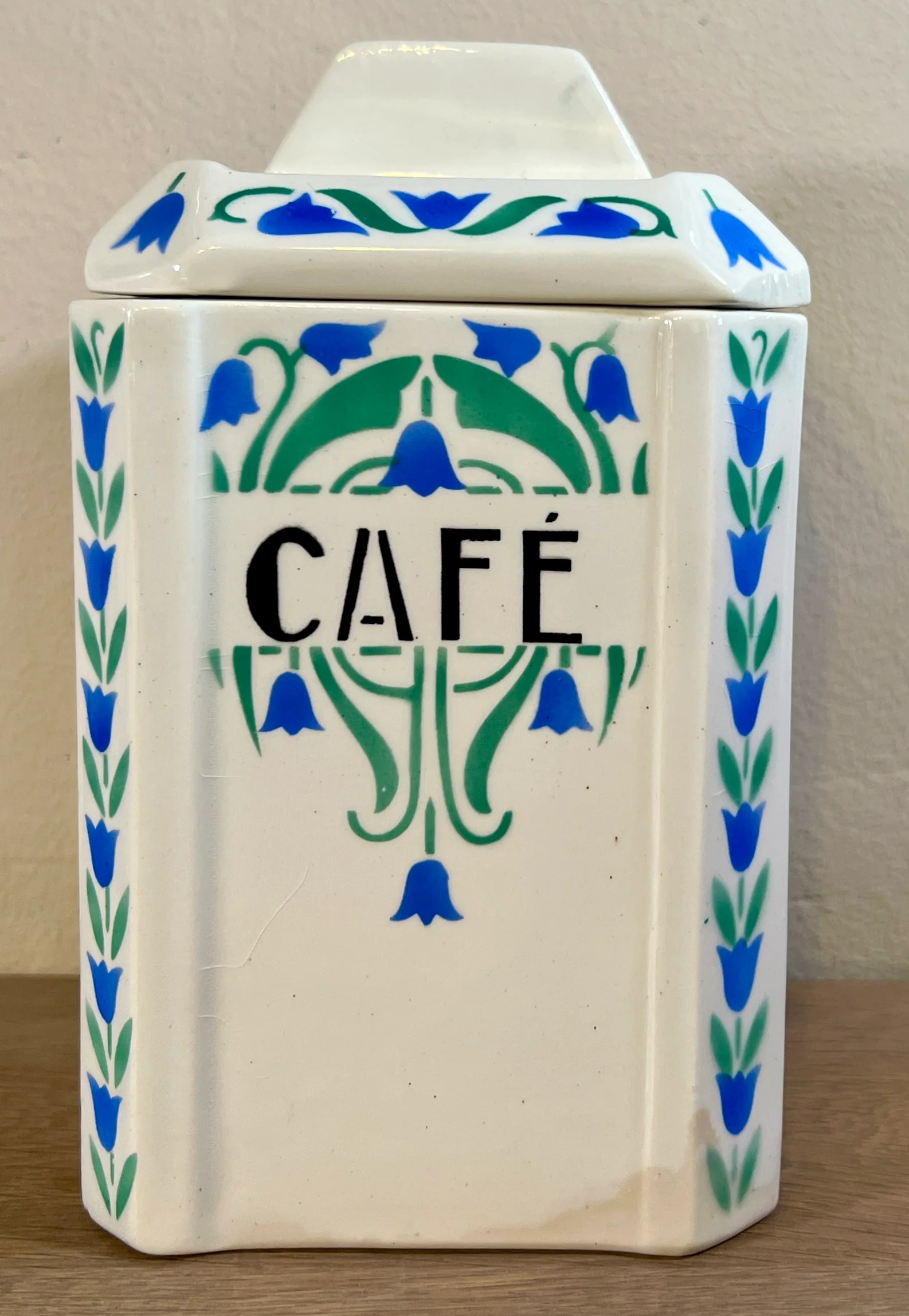 Voorraadpot – Nimy – décor in blauw en groen met bladeren en bloemetje – opschrift CAFÉ