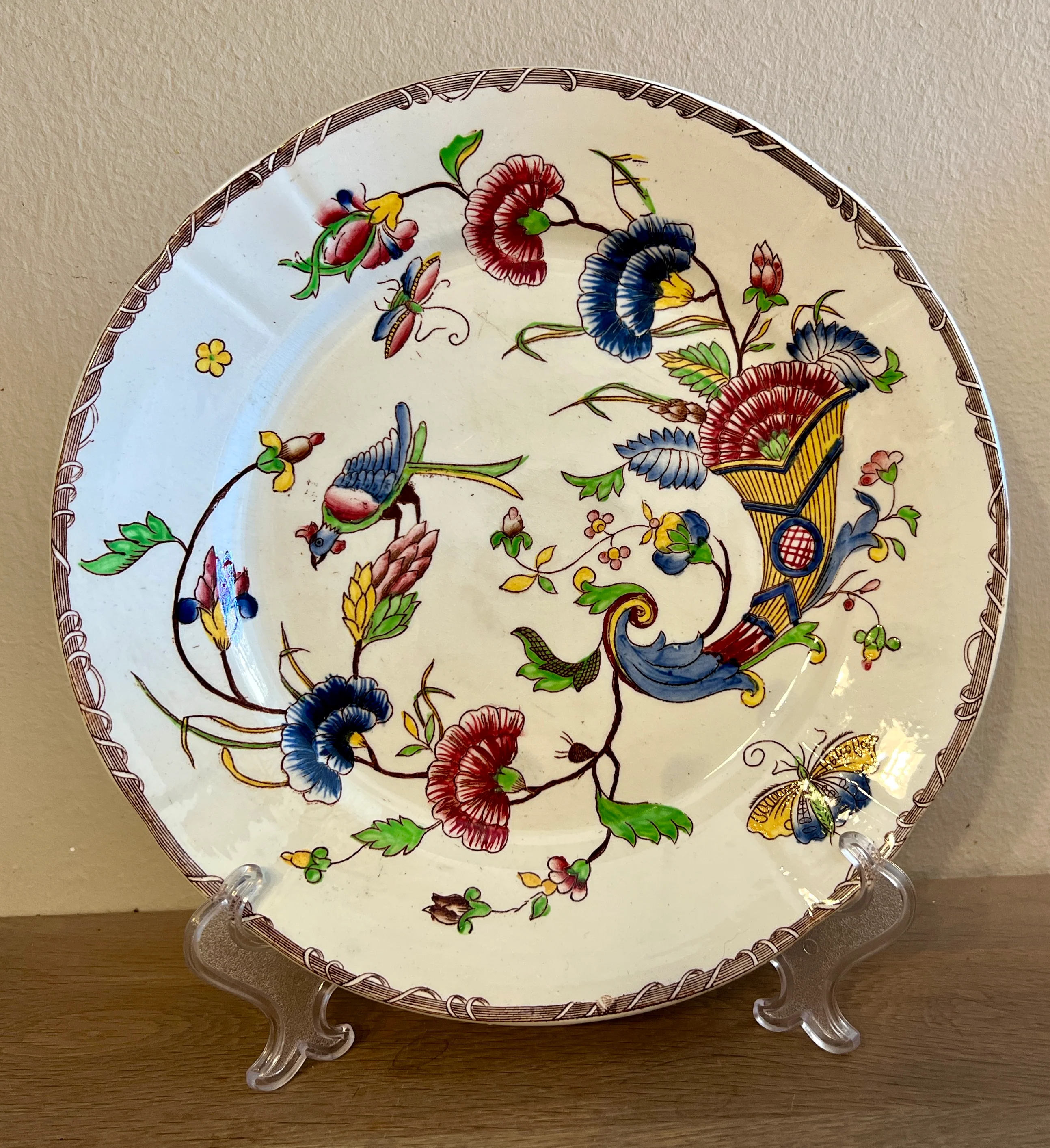Bord / Dinerbord – ongemerkt maar Nimy – décor in meerdere kleuren met vogel, bloemen en insecten