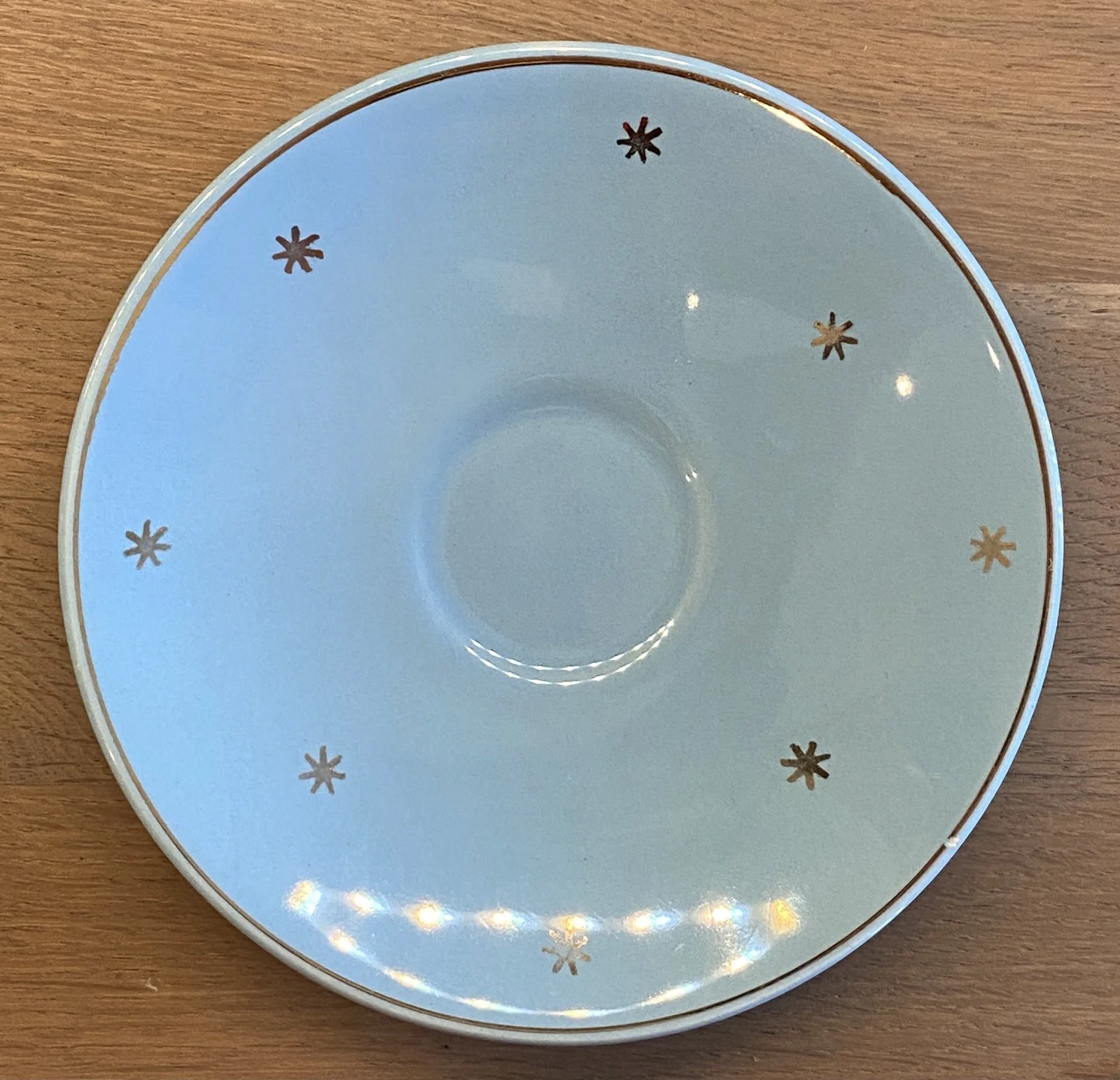 Schoteltje – ongemerkt – blauw met goudkleurige sterretjes Schoteltje – ongemerkt – blauw met goudkleurige sterretjes