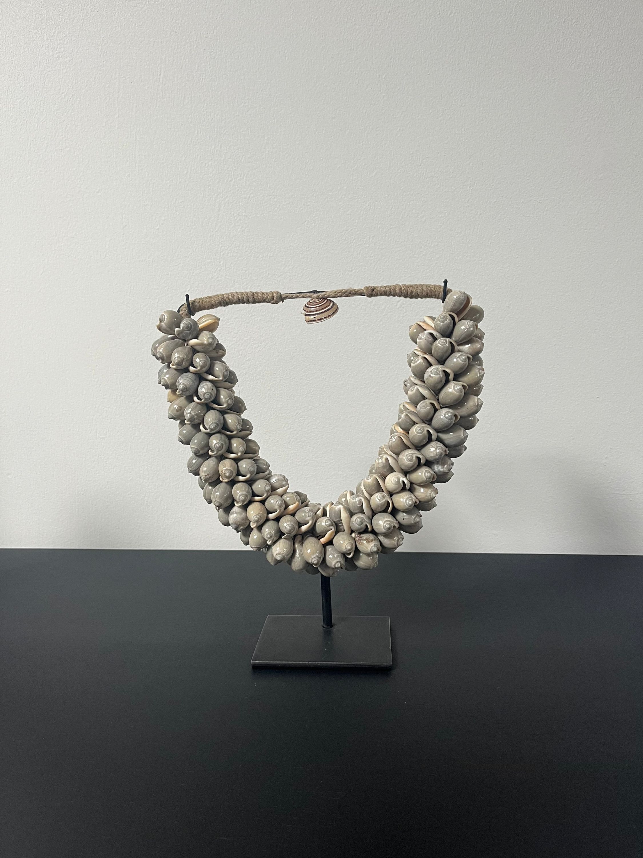 Schelpenketting sand